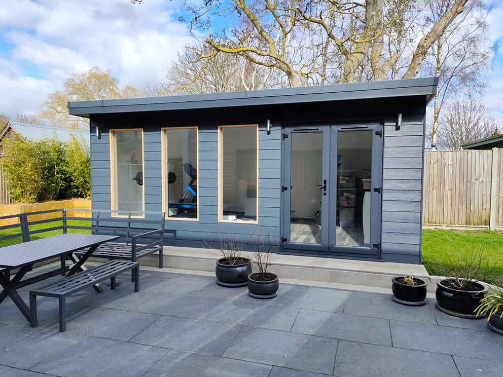 Completed dark timber garden building